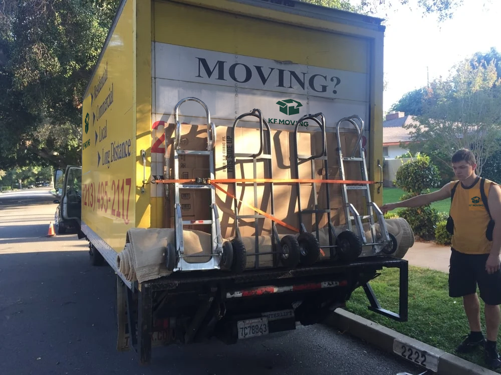 Moving equipment secured to the liftgate of a KF Moving truck